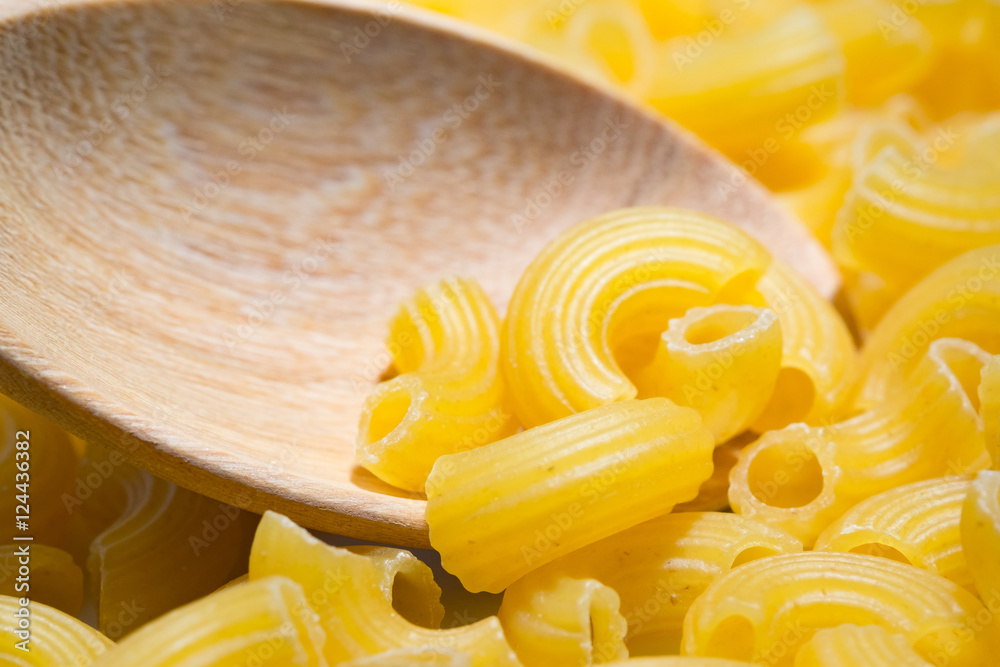 pasta  in wooden spoons