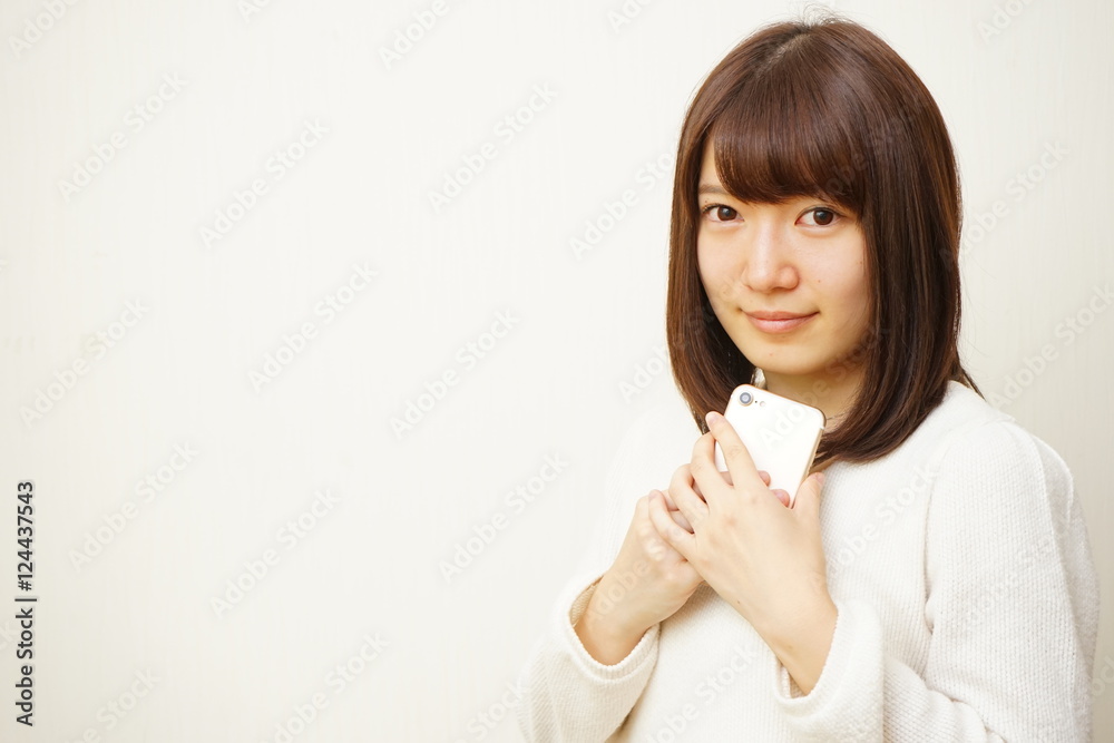 Young attractive woman using her smart phone Young attractive woman using her smart phone