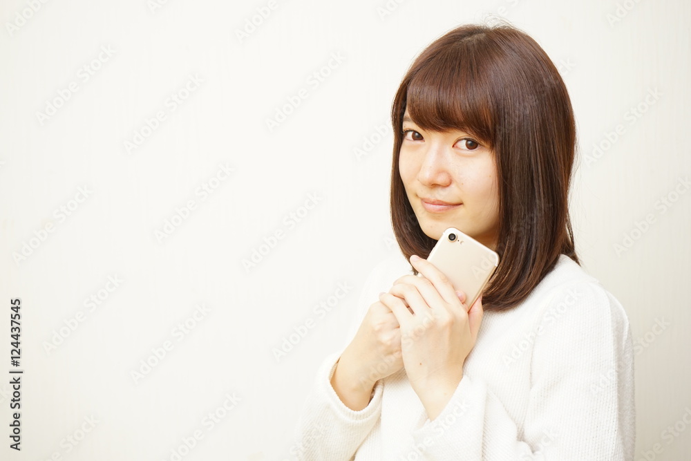 Young attractive woman using her smart phone Young attractive woman using her smart phone