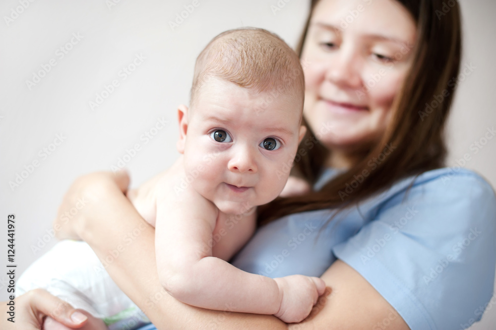 picture of happy mother with baby in hands picture of happy mother with baby in hands