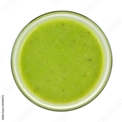 Fresh, just made, kiwi smoothie with greenery isolated on white - bird's-eye view