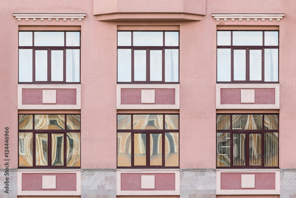 Several windows in a row on facade of Medical center 