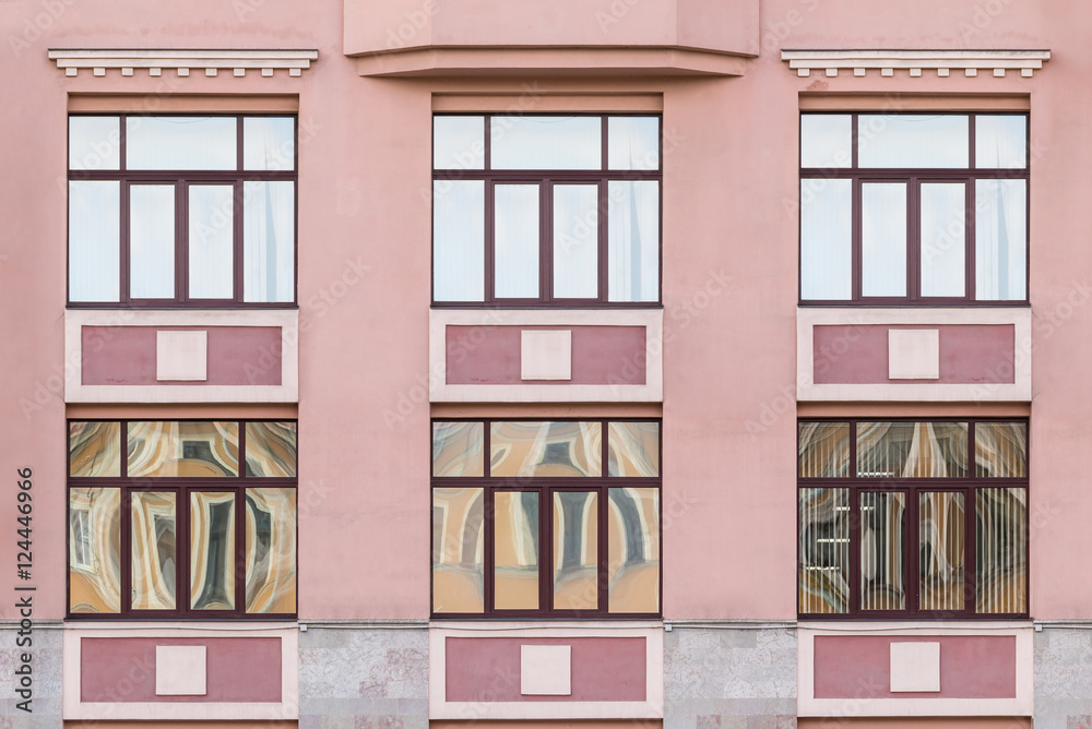 Fototapeta premium Several windows in a row on facade of Medical center