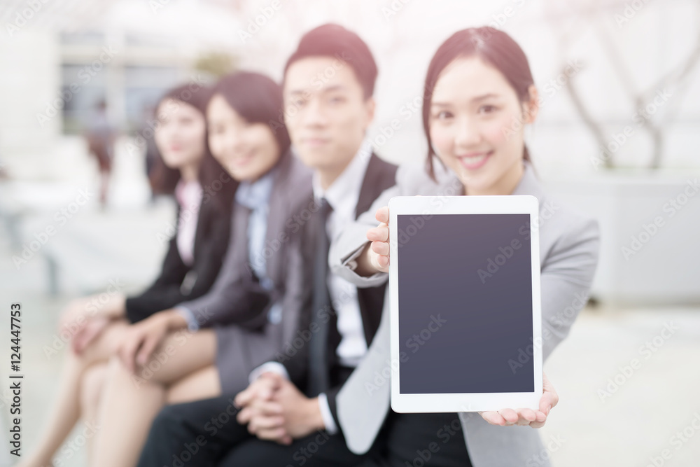 businesspeople show tablet to you businesspeople show tablet to you