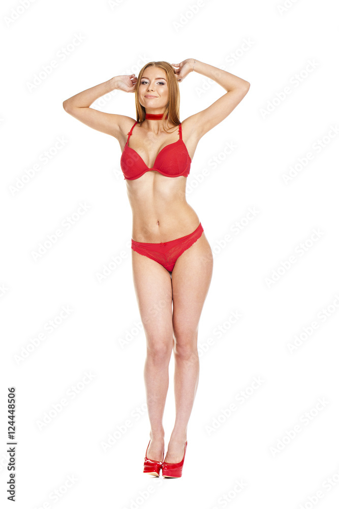 Young beautiful blonde woman in red bikini