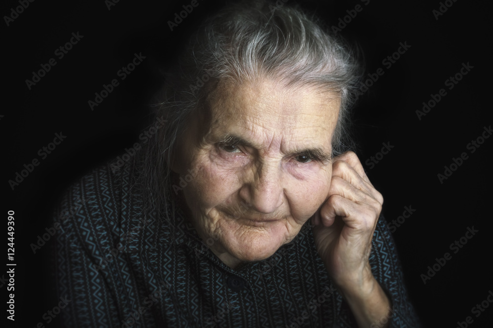 Portrait of a sad elderly woman. Dreaming the past. Portrait of a sad elderly woman. Dreaming the past.