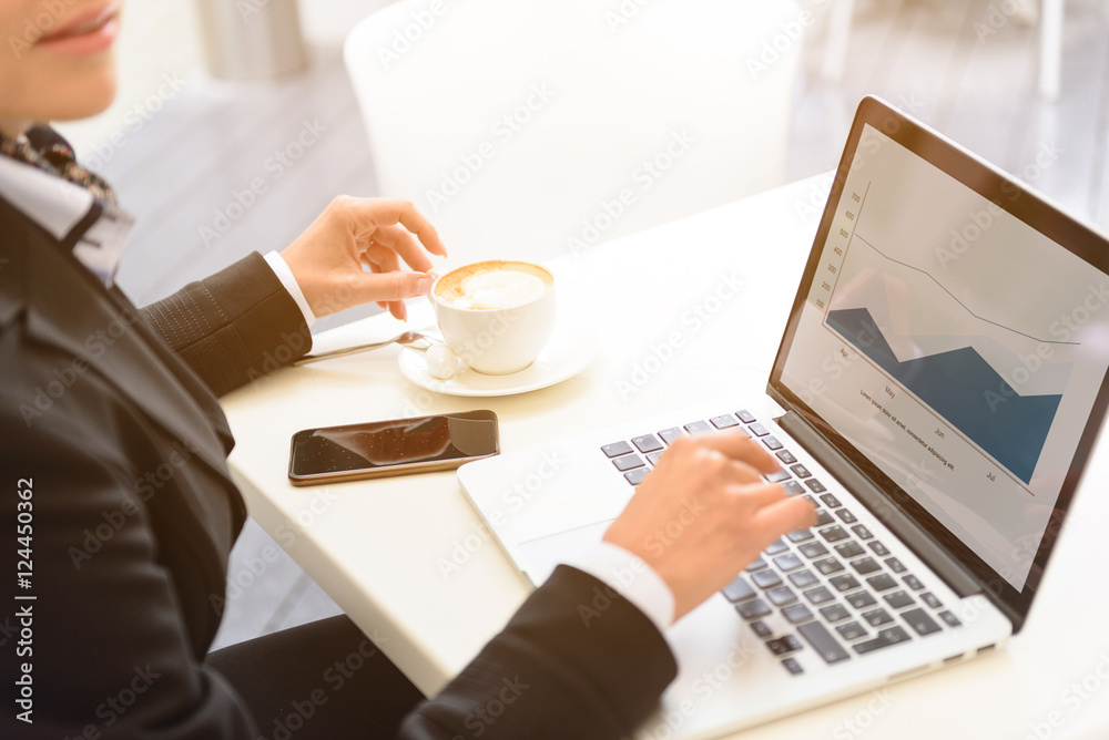 Business lady working with computer on break Business lady working with computer on break