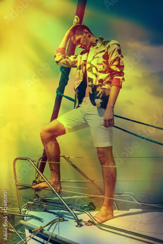 Stylish trendy man on a regatta