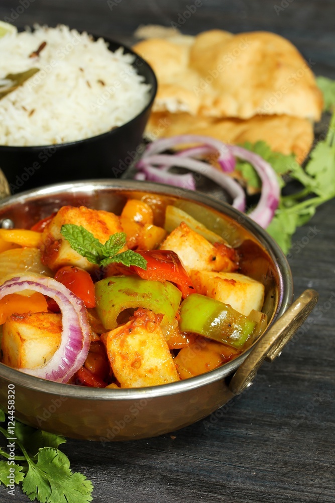 Kadai Paneer served with rice and Bhatura Kadai Paneer served with rice and Bhatura