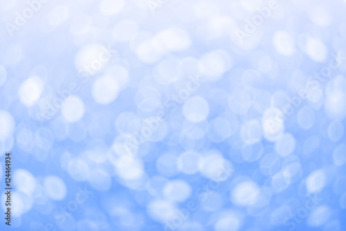 blue-white bokeh lights blurred abstract background
