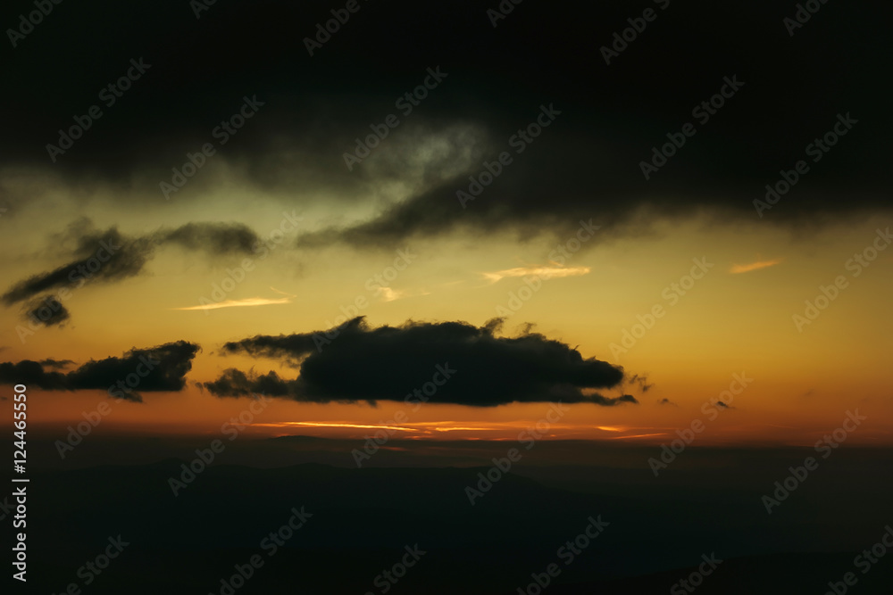 Fototapeta premium Beautiful mountain peaks with sunset