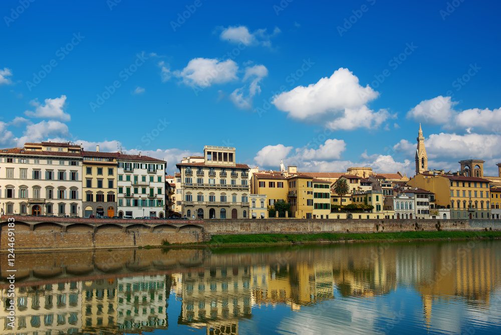 Embankment of the Arno River near Ponte Vecchio and Uffizi Gallery, Florence, Italy. Travel outdoor sightseeing background.