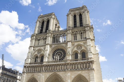 Paris, France - famous Notre Dame cathedral facade saint statues. UNESCO World Heritage Site.