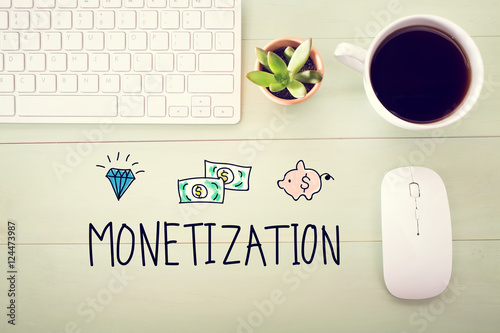 Monetization concept with workstation photo