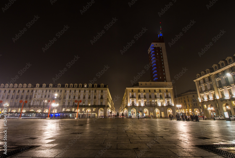 night view of the illuminated piazza castello - castle square in the italian city torino.