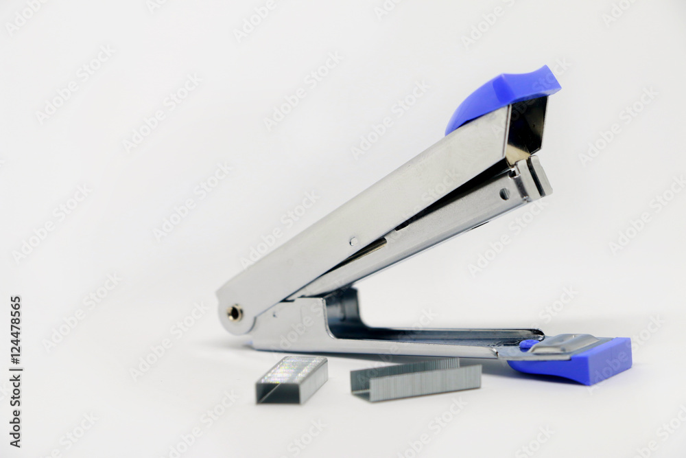 Stapler,Office tool. Stapler on the white background. Miscellaneous of office equipment. Paper clip,Stapler Stapler,Office tool. Stapler on the white background. Miscellaneous of office equipment. Paper clip,Stapler