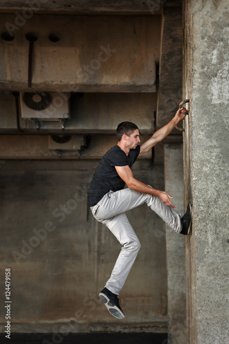 Man of parkour in urban space.