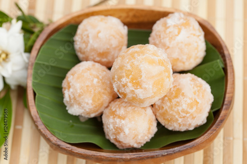 Candy Akehgss on banana leaf vintage wooden, Natural background, photo