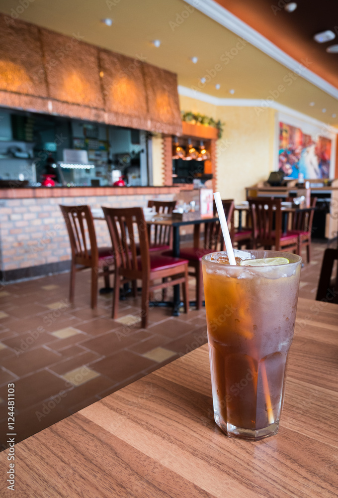 Glass of ice lemon tea in luxury restaurant Glass of ice lemon tea in luxury restaurant