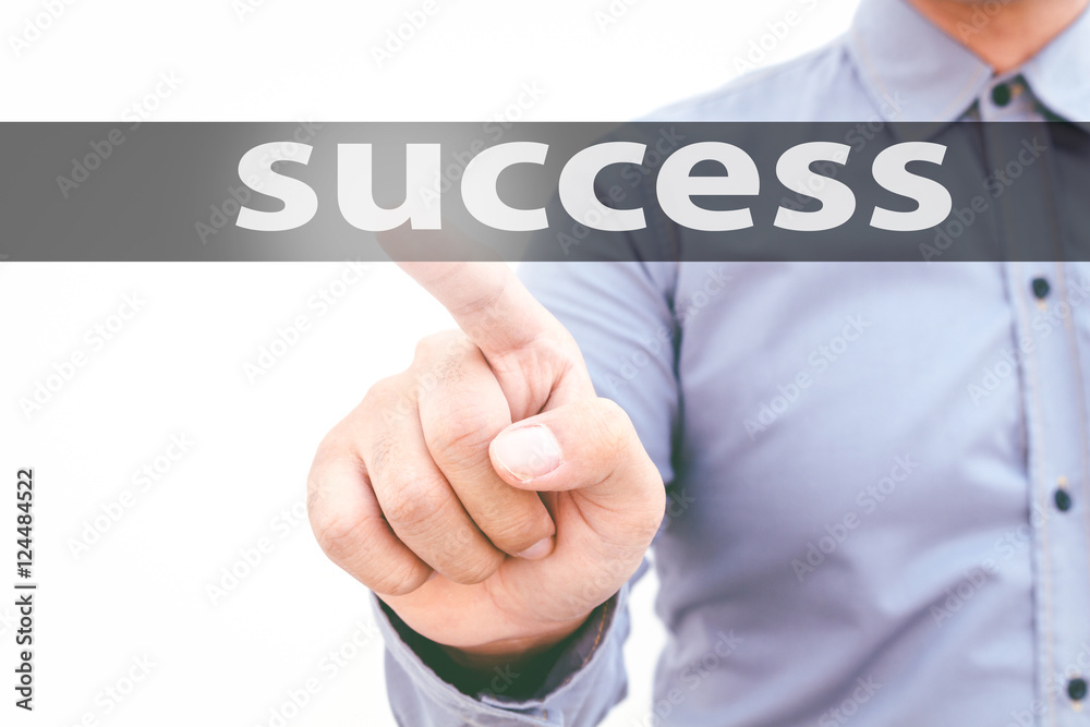 Businessman hand touching success on virtual screen Businessman hand touching success on virtual screen
