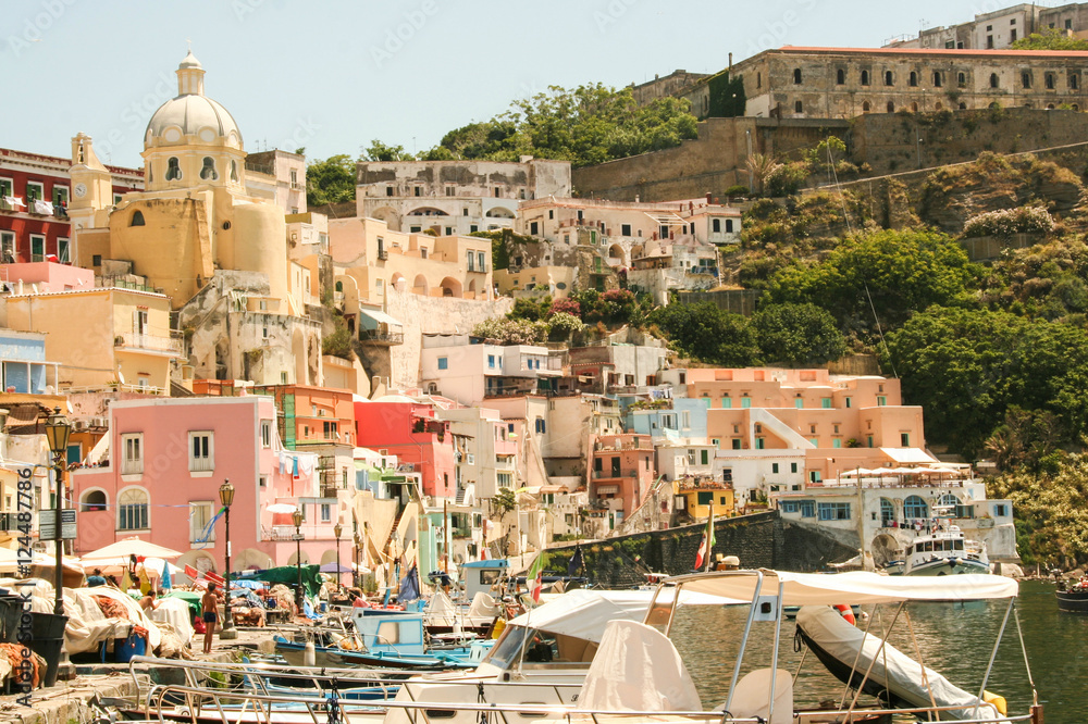 the charming port of Corricella, with its colorful fishermen's houses and boats, Island of Procida, Naples , Italy 
