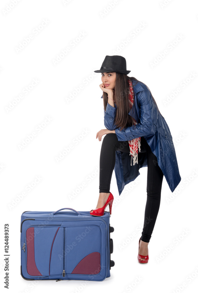 Young girl with the travel bag, isolated on white background Young girl with the travel bag, isolated on white background
