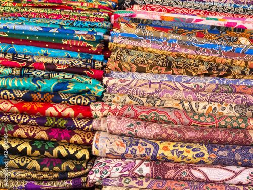 Colorful sarongs on sale in the market at Ubud in Bali, Indonesia.