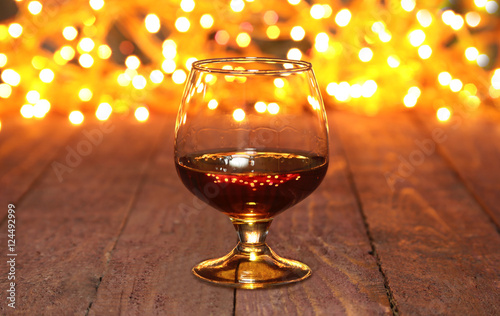 photo cognac glass in front of bokeh background