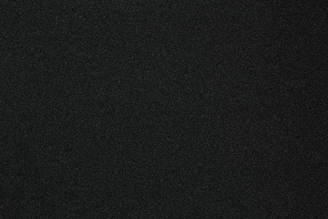 Black monotone grain texture. Glitter sand background.