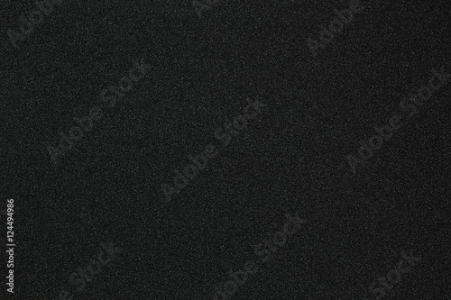 Fototapet Black monotone grain texture. Glitter sand background.
