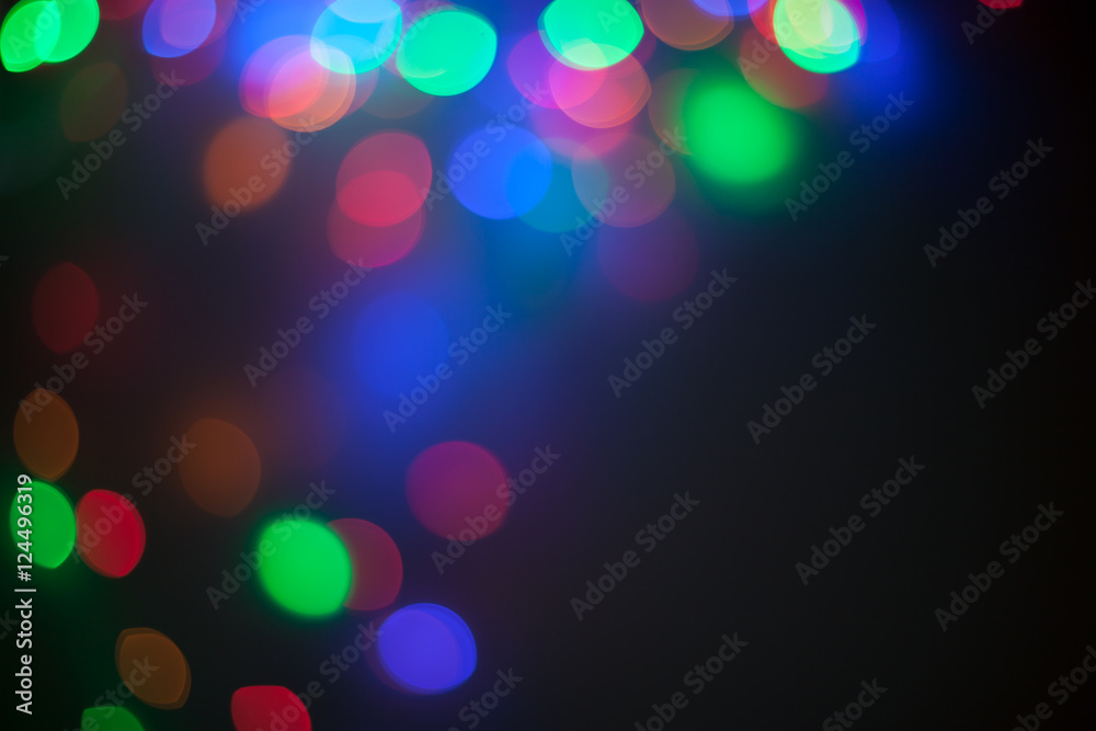 Defocused christmas lights bokeh background Defocused christmas lights bokeh background