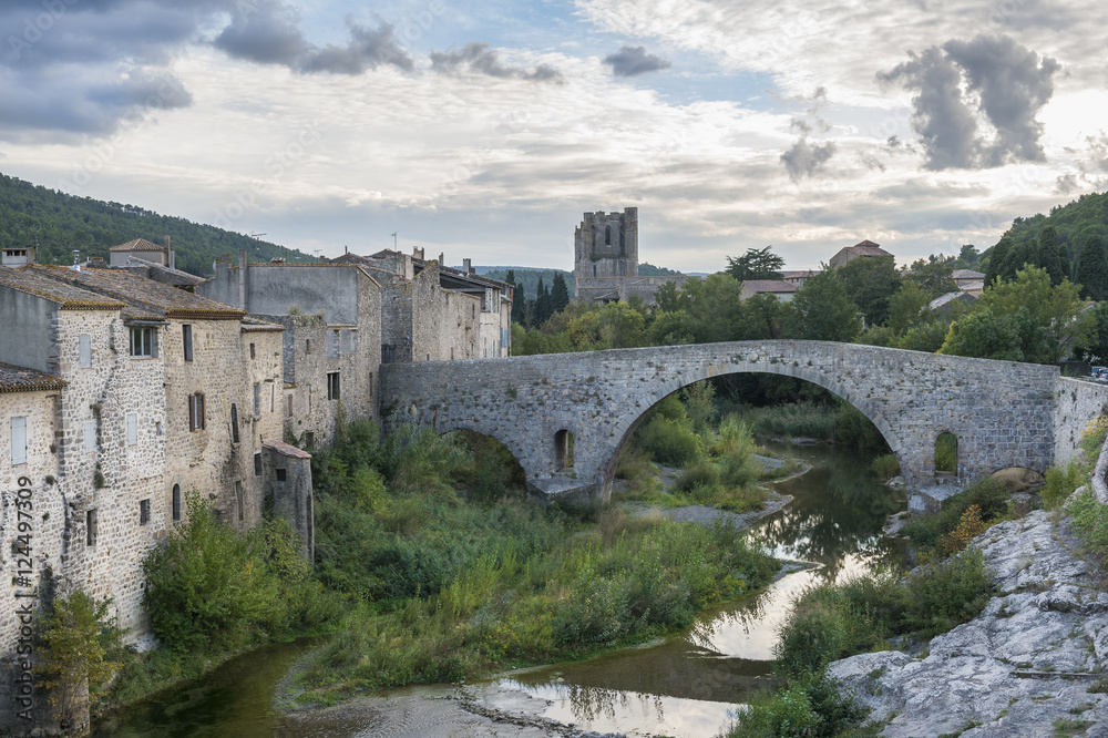 View of the medieval bridge and city of Lagrasse, France