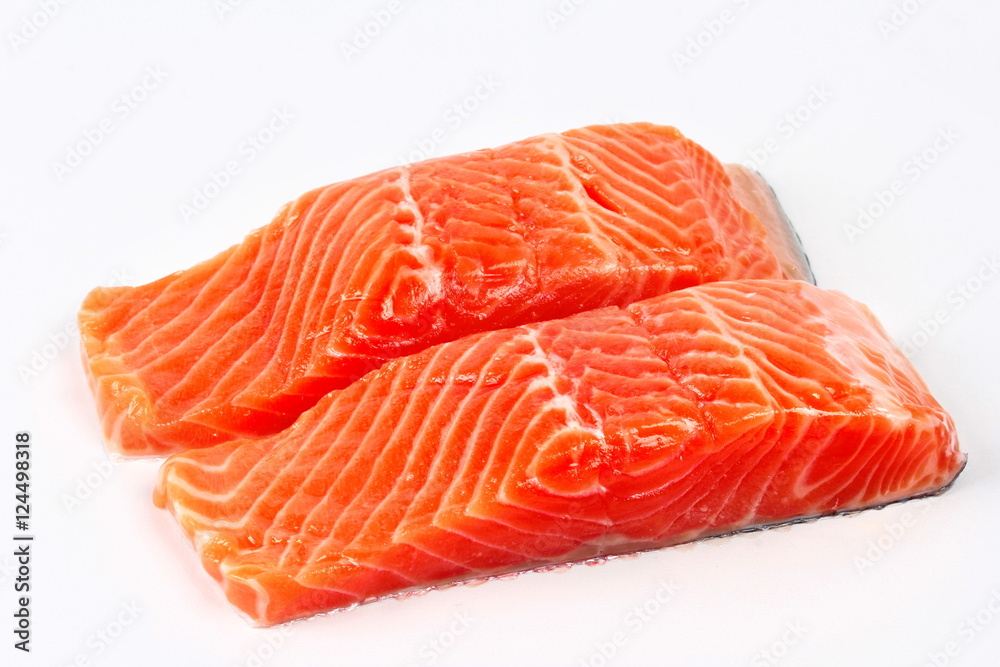 Ready raw fresh salmon for cooking or served isolated on white background Ready raw fresh salmon for cooking or served isolated on white background