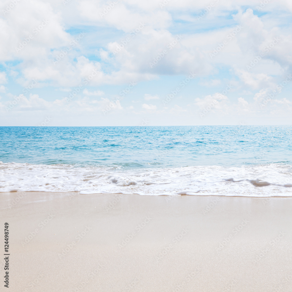 View of nice tropical beach with white sand and blue water View of nice tropical beach with white sand and blue water