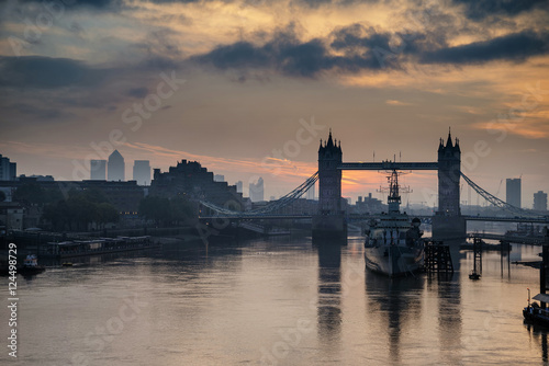 Golden Autumn sunrise over Tower Bridge in London.