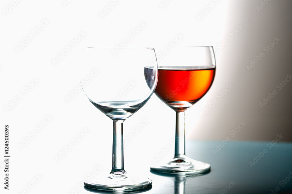 Wine in the glasses, light background