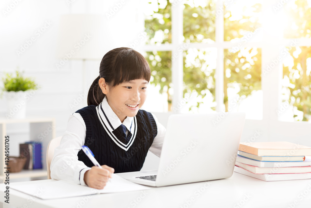 happy teenager Student studying with laptop happy teenager Student studying with laptop