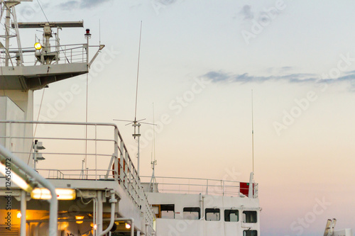 White cargo ship at dawn