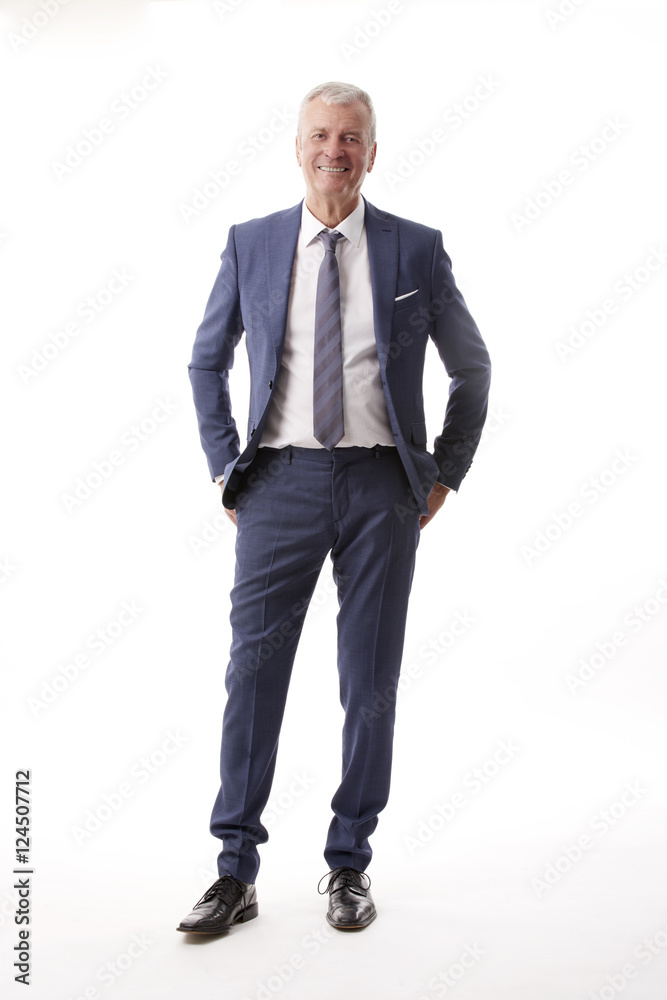 Old businessman portrait.Full length shot of a senior manager standing in suit at isolated white background. Old businessman portrait.Full length shot of a senior manager standing in suit at isolated white background.