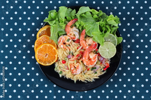 Spicy sour minced green mango salad with shrimp. photo