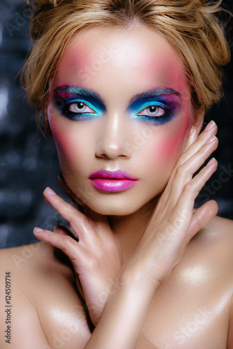 High fashion look.glamor closeup portrait of beautiful sexy stylish blond young woman model with bright makeup and pink lips with perfect clean skin 