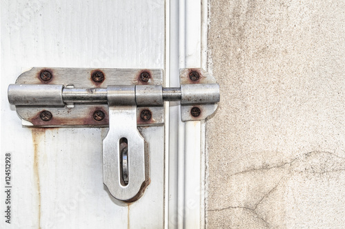 old lock on wooden door © Win Nondakowit