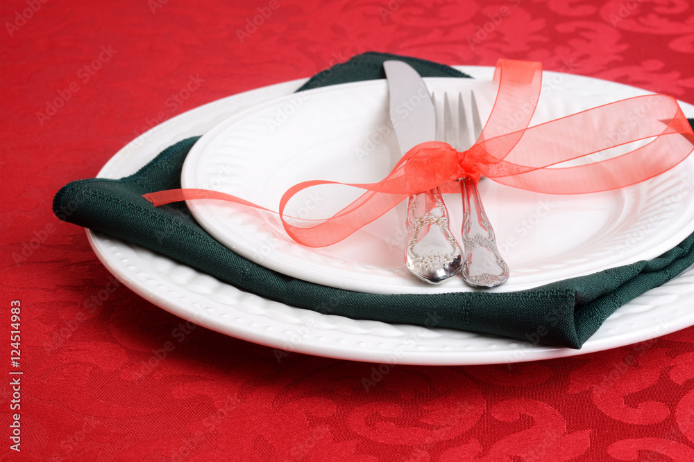 closeup of christmas place settings closeup of christmas place settings