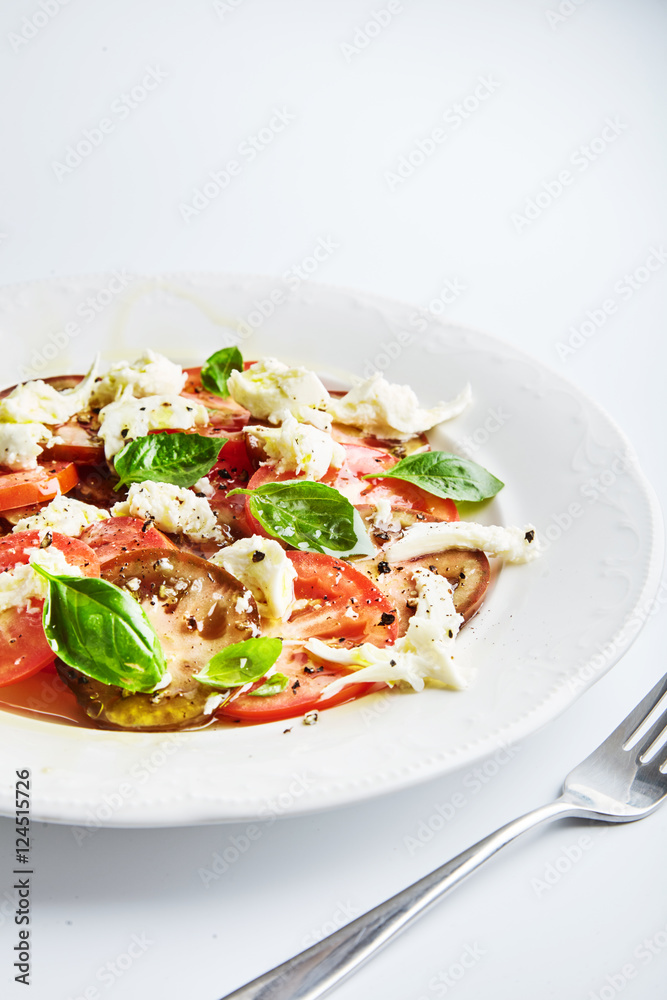Italian caprese, mozzarella, tomatoes, basil