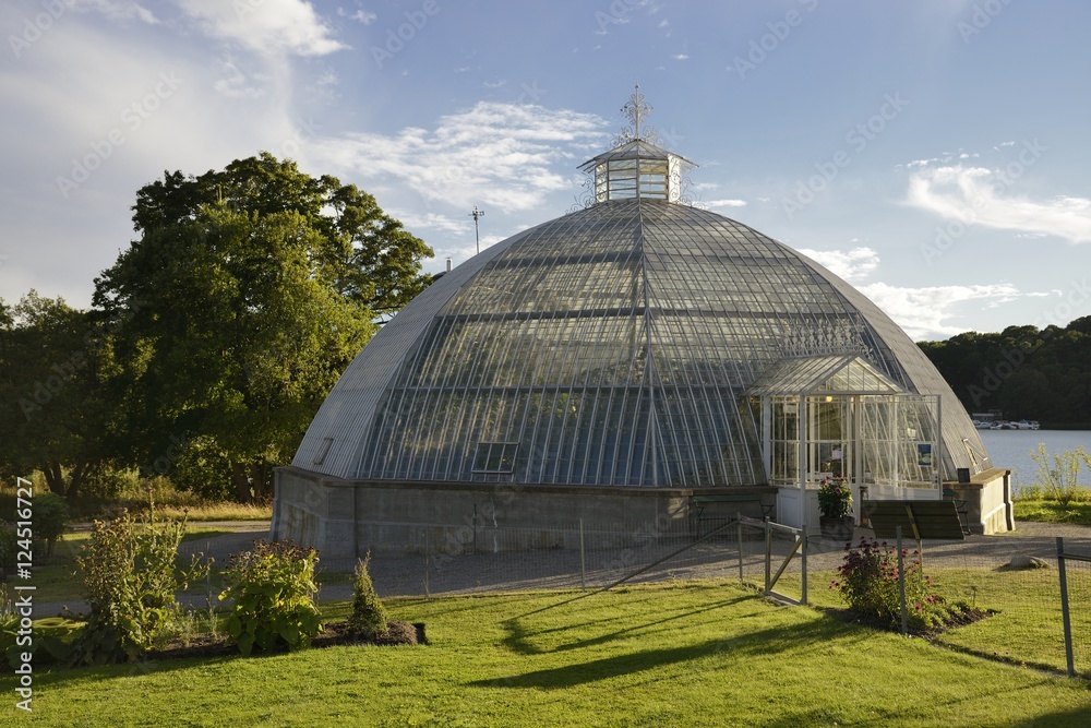 Old Greenhouse Dome in summer light. Old Greenhouse Dome in summer light.