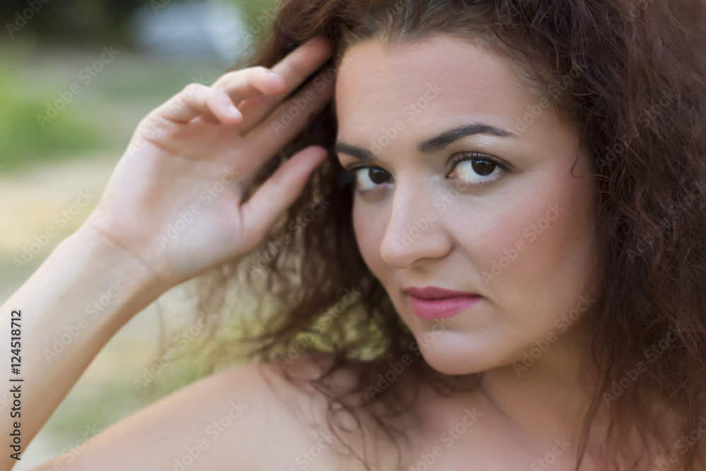 Portrait close up of young beautiful woman, on green background.Soft Focus Portrait close up of young beautiful woman, on green background.Soft Focus