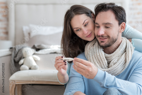Fotografie Nice joyful couple recovering from an illness