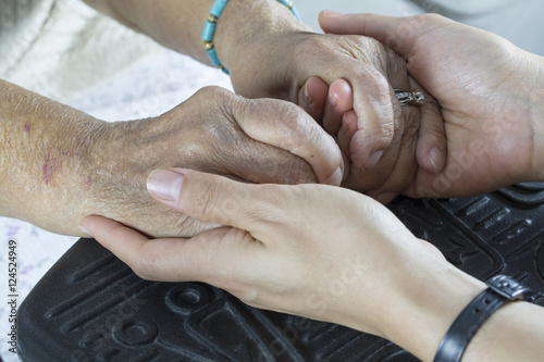 Tableau sur toile Holding Hands