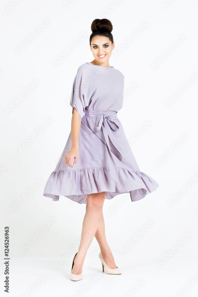 Beautiful woman in Dress. Fashion. Isolated over white. Beautiful woman in Dress. Fashion. Isolated over white.