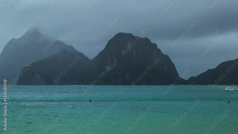 Rain storm is approaching on the mountain Island in El Nido. Palawan island, Philippines Rain storm is approaching on the mountain Island in El Nido. Palawan island, Philippines